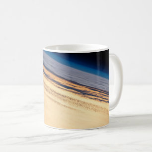 Een orbitale zonsondergang voor de kust van Baja C Koffiemok