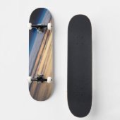 Een orbitale zonsondergang voor de kust van Baja C Persoonlijk Skateboard (Voorkant)