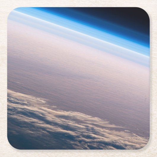 Een orbitale zonsondergang voor de kust van Cabo S Kartonnen Onderzetters (Voorkant)