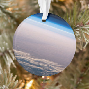 Een orbitale zonsondergang voor de kust van Cabo S Ornament