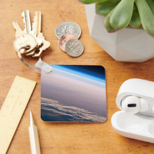 Een orbitale zonsondergang voor de kust van Cabo S Sleutelhanger