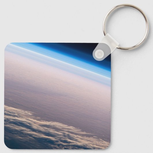 Een orbitale zonsondergang voor de kust van Cabo S Sleutelhanger (Achterkant)