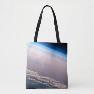 Een orbitale zonsondergang voor de kust van Cabo S Tote Bag