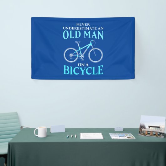 Een oud Man op een fiets Spandoek (Beurs)