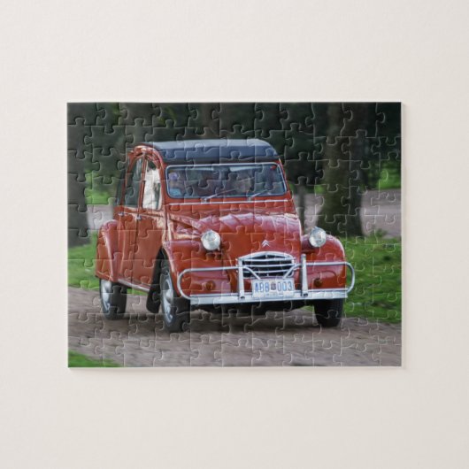 Een oude rode Citroen 2CV auto met een lachende vr Legpuzzel (Horizontaal)