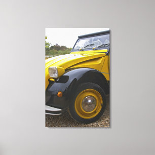 Een oude zwarte en gele Citroen 2CV 2 CV, Canvas Afdruk