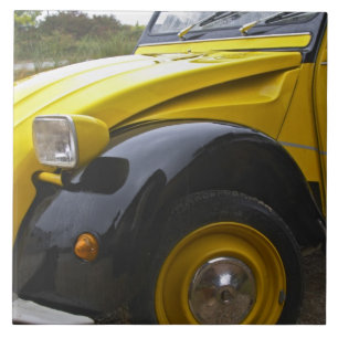 Een oude zwarte en gele Citroen 2CV 2 CV, Tegeltje