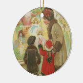 Een ouderwetse kerstfeestelijke organisatie keramisch ornament (Links)