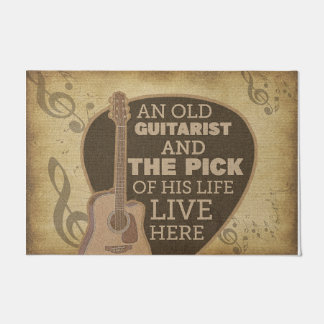 Een ouwe gitarist en de dief van zijn leven deurmat