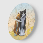 Een paar katten: liefde is in de lucht? Grote klok (Hoek)