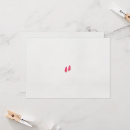 Een paar rode bladeren op een zwarte achtergrond kaart