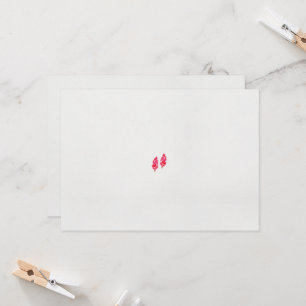 Een paar rode bladeren op een zwarte achtergrond kaart