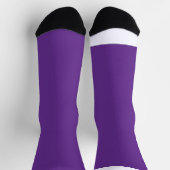 Een paarse achtergrond met een sokken (Top)