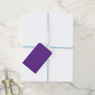 Een paarse achtergrond met een witte rand cadeaulabel
