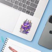 Een Paarse Dragon Reading Sticker (Laptop met iPhone)