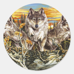 Een pak wolven die over een logboek springen ronde sticker