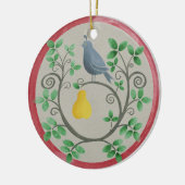 Een pap in een kerstversiering met perenbomen keramisch ornament (Links)