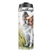 Een Papillon hond in hoog gras Thermosbeker (Voorkant)