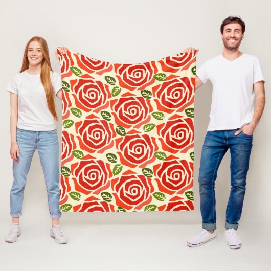 Een patroon van grote rozen rode, groene en witte  fleece deken (In situ)