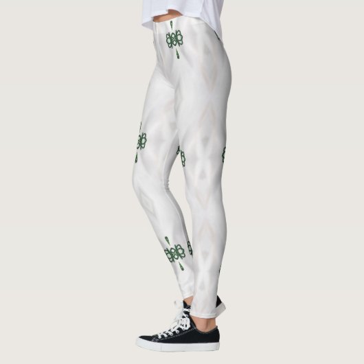 Een patroon van witte sneeuw en kerstlint leggings (Links)