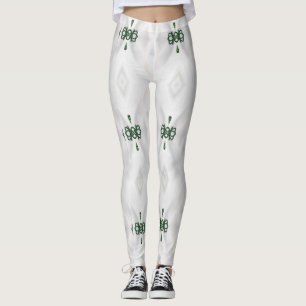 Een patroon van witte sneeuw en kerstlint leggings