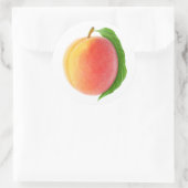 Eén perzik met blad ronde sticker (Tas)