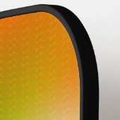 Een pickleball-paddle met een levendig verloopdesi pickleball paddle (Links Detail)
