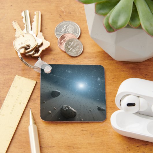 Een planetoïdengordel rond de heldere ster Vega. Sleutelhanger (Bureau)