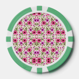Een pokerchip met een bloempatroon in roze 