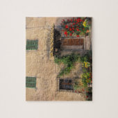 Een prachtig oud huis met bloemen in San Gimignano Legpuzzel (Verticaal)