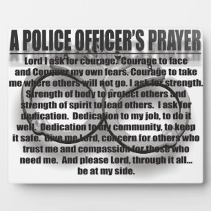 EEN PRAYERPLAQUE VAN EEN POLITIEBUREAU FOTOPLAAT