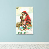 Een prettige kerstkerstman die speelgoed pakt in z canvas afdruk (Insitu (Houten vloer))