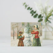 Een prettige kerstvrouw, een kind en een feestdag  feestdagenkaart (Staand voorkant)