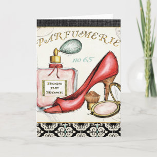 Een Red Shoe, een fles parfum en blush Powder Kaart
