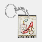 Een Red Shoe, een fles parfum en blush Powder Sleutelhanger (Voorkant Links)