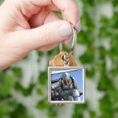 Een reddingsboor wordt uitgevoerd in de cockpit sleutelhanger (Hand)