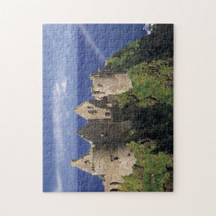 Een regenboog boven middeleeuws kasteel Dunluce Legpuzzel