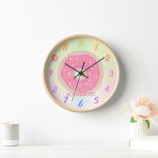 Een regenboog van kleuren, een roze donut met een  (Huis)