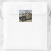 Een rij humvees van het militaire beleid van de ta vierkante sticker (Tas)