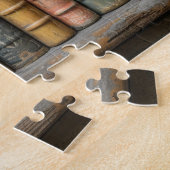 Een rij oude boeken met verfraaide bloemen legpuzzel (Zijkant)