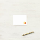 Eén rijpe appel post-it® notes (Op bureau)