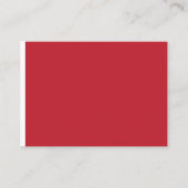 Een rode achtergrond met een plaatskaartje (Voorkant)