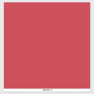 Een rode achtergrond met een sticker