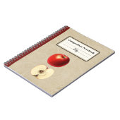 Een rode appel en een half gepersonaliseerde compo notitieboek (Linkerzijde)