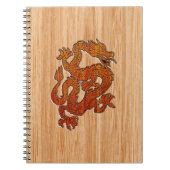 Een rode draak op Bamboe als Notitieboek (Voorkant)