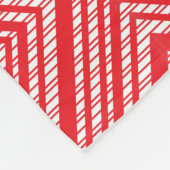 Een rode en witte achtergrond met een diamantpatro fleece deken (Hoek)