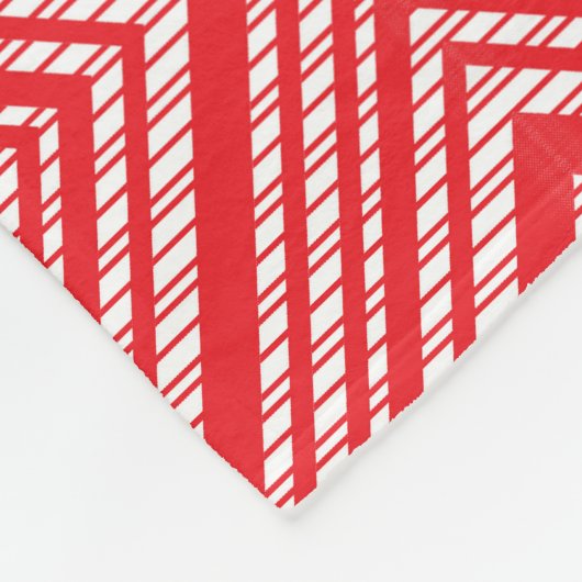 Een rode en witte achtergrond met een diamantpatro fleece deken (Hoek)