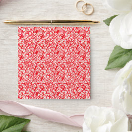 Een rode en witte achtergrond met kleine witte sti envelop