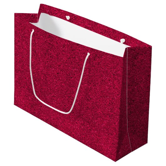 Een rode glinsterende cadeautas met witte handvatt (Voorkant Gekanteld)