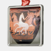 Een rode klokkrater metalen ornament (Links)